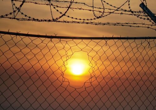 fence with barb wire